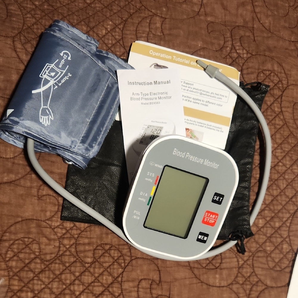 Blood Pressure Monitor. With One Size Fits-all Cuff Electronic And Rechargeable